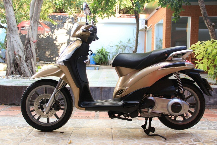 Sơn xe Liberty 125 màu vàng zin uy tín